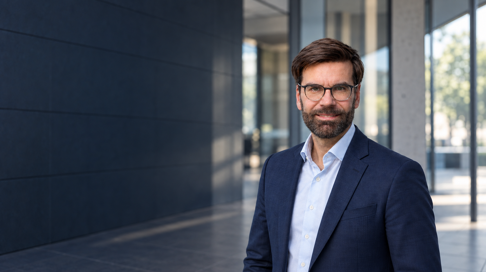 Jan Stöckel in a contemporary business setting.